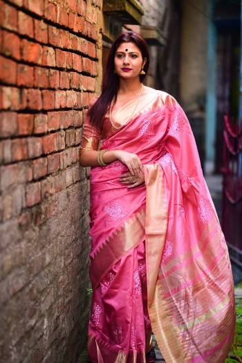 Celebrate This Festive Season In This Very Pretty Pink Colored Designer Saree Paired With Contrasting Pink Colored Blouse. This Saree and Blouse Are Assam Silk Based Beautified With Wevon Jari Designer Saree. 