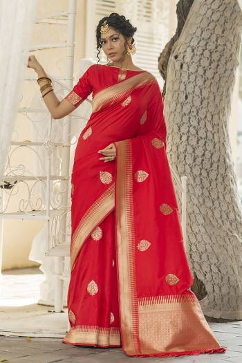 Look Attractive Wearing This Saree Paired With Blouse.  This Heavy Wevon Jari Designer Saree Is Banarasi Silk Based Which Gives A Rich Look To Your Personality. Buy This Pretty Saree Now.