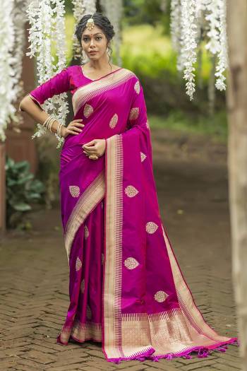 Look Attractive Wearing This Saree Paired With Blouse.  This Heavy Wevon Jari Designer Saree Is Banarasi Silk Based Which Gives A Rich Look To Your Personality. Buy This Pretty Saree Now.