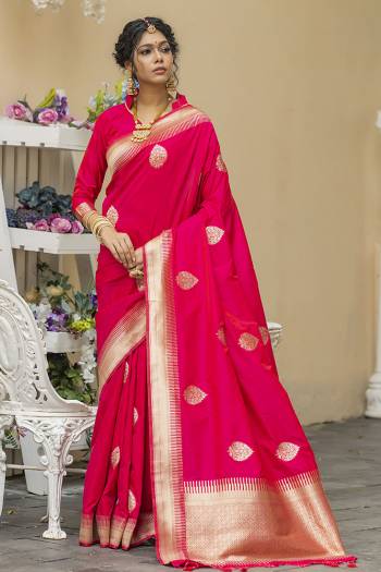 Look Attractive Wearing This Saree Paired With Blouse.  This Heavy Wevon Jari Designer Saree Is Banarasi Silk Based Which Gives A Rich Look To Your Personality. Buy This Pretty Saree Now.