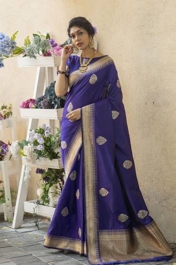 Look Attractive Wearing This Saree Paired With Blouse.  This Heavy Wevon Jari Designer Saree Is Banarasi Silk Based Which Gives A Rich Look To Your Personality. Buy This Pretty Saree Now.