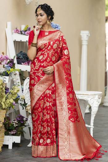 Look Attractive Wearing This Saree Paired With Blouse.  This Heavy Wevon Jari Designer Saree Is Banarasi Silk Based Which Gives A Rich Look To Your Personality. Buy This Pretty Saree Now.