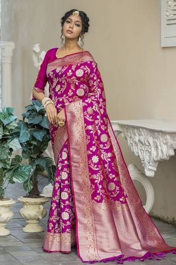 Look Attractive Wearing This Saree Paired With Blouse.  This Heavy Wevon Jari Designer Saree Is Banarasi Silk Based Which Gives A Rich Look To Your Personality. Buy This Pretty Saree Now.