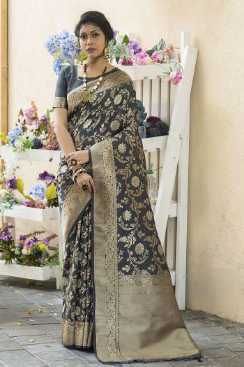 Look Attractive Wearing This Saree Paired With Blouse.  This Heavy Wevon Jari Designer Saree Is Banarasi Silk Based Which Gives A Rich Look To Your Personality. Buy This Pretty Saree Now.