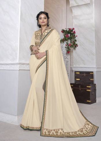 Adorn The Pretty Angelic Look Wearing This Heavy Designer Saree In Fine Color Paired With Contrasting Colored Blouse. This Saree Is Fabricated On Dola Silk Paired With Dupian Fabricated Blouse. Its Pretty Color Pallete Will Give An Attractive Look To Your Personality. 