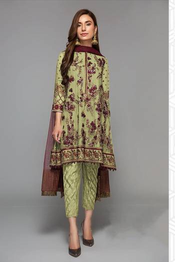 Grab This Beautiful Heavy Designer Pakistani Straight Suit In Light Color Paired With Maroon Colored Dupatta. Its Heavy Embroidered And Diamond Work Top Is Fabricated On Faux Georgette Paired With Santoon Bottom and Butterfly Net Fabricated Dupatta. 

