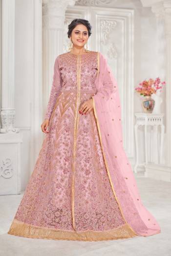 Look Pretty This Designer Floor Length Suit In Lovely Pink Color.?Its Pretty Embroidred Top Is Net Based Paired With Santoon Bottom And Net Fabricated Embroidered Dupatta Which Gives An Attractive To The Suit.