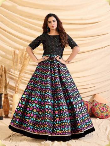 Flaunt Your Rich And Elegant Taste Wearing This Designer Semi Stitched Long Gown In Black Color. This  Pretty Gown Is Fabricated On Tafetta Silk Beautified With Pigment Multy Color Foil Print. Its Fabric Is Soft Towards Skin And Easy To Carry All Day Long. 