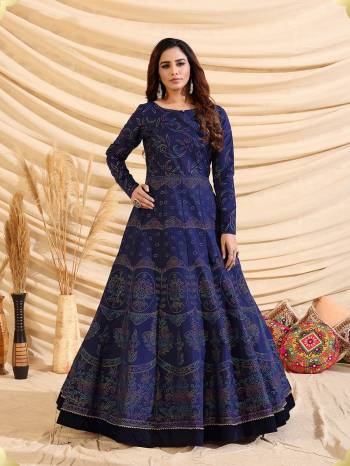 Flaunt Your Rich And Elegant Taste Wearing This Designer Semi Stitched Long Gown In Nevy Blue Color. This  Pretty Gown Is Fabricated On Tafetta Silk Beautified With Pigment Multy Color Foil Print. Its Fabric Is Soft Towards Skin And Easy To Carry All Day Long. 