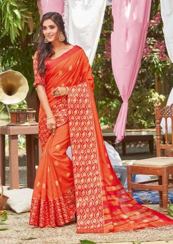 For A Decent And Formal Look, Grab This Pretty Elegant Looking Saree In Dark Color Paired With Contrasting Colored Blouse. This Saree And Blouse Are Fabricated On Crystal Silk Beautified With Broad Weaved Border And Pallu.