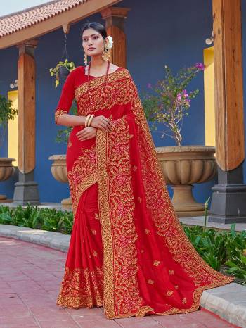 Look Attractive Wearing This Red Colored Saree Paired With Red Colored Blouse.  This Heavy Designer Embroidery Saree Is Vichitra Silk Based Which Gives A Rich Look To Your Personality. Buy This Pretty Saree Now.