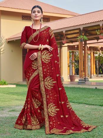 Look Attractive Wearing This Maroon Colored Saree Paired With Maroon Colored Blouse.  This Heavy Designer Embroidery Saree Is Vichitra Silk Based Which Gives A Rich Look To Your Personality. Buy This Pretty Saree Now.