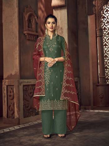 Grab This Beautiful Heavy Designer Straight Suit In Fine Color Paired With Dupatta. Its Heavy Embroidered Work Top Is Fabricated On Rass Silk Paired With Santoon Bottom and Organza Fabricated Embroidery Dupatta. 

