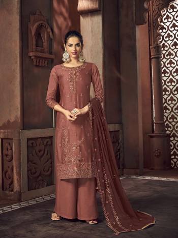 Grab This Beautiful Heavy Designer Straight Suit In Fine Color Paired With Dupatta. Its Heavy Embroidered Work Top Is Fabricated On Rassion Silk Paired With Santoon Bottom and Organza Fabricated Embroidery Dupatta. 

