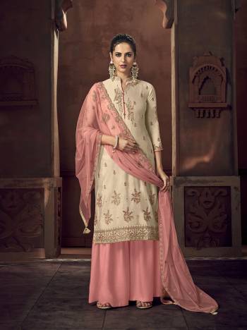 Grab This Beautiful Heavy Designer Straight Suit In Fine Color Paired With Dupatta. Its Heavy Embroidered Work Top Is Fabricated On Tusser Silk Paired With Santoon Bottom and Net Fabricated Embroidery Dupatta. 

