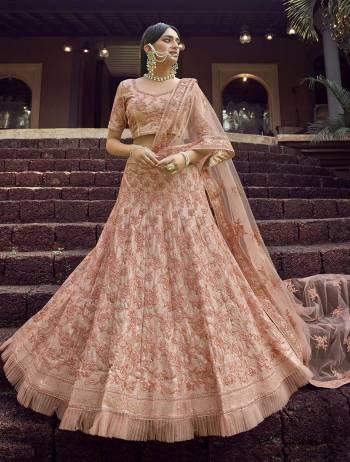 Heavy Designer Lehenga Choli In Peach Color Fabricated On Georgette Beautified With Soft Net Fabricated Dupatta Heavy Attractive Embroidery. 