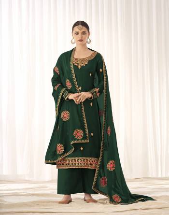 Attrective This Beautiful Heavy Designer Straight Suit In Fine Color Paired With Dupatta. Its Heavy Embroidered Work Top Is Fabricated On Tussal Silk Paired With Dull Santoon Bottom and Rangoli Georgette Fabricated Embroidery Dupatta. 

