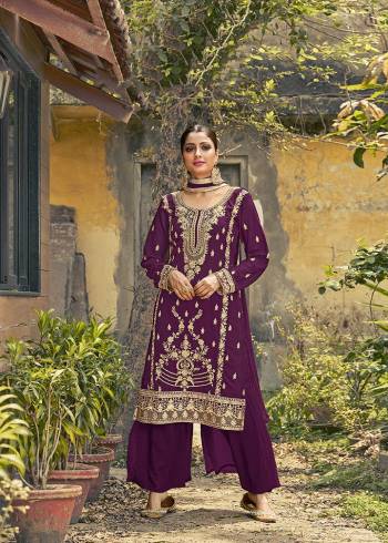 Garb This Beautiful Heavy Designer Straight Suit In Wine Color Paired With Dupatta. Its Heavy Embroidered Work Top Is Fabricated On Faux Georgette Paired With Santoon Bottom and Naznin Fabricated Dupatta. 

