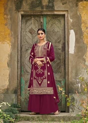 Garb This Beautiful Heavy Designer Straight Suit In Mugenta Color Paired With Dupatta. Its Heavy Embroidered Work Top Is Fabricated On Faux Georgette Paired With Santoon Bottom and Naznin Fabricated Dupatta. 

