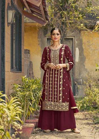 Garb This Beautiful Heavy Designer Straight Suit In Maroon Color Paired With Dupatta. Its Heavy Embroidered Work Top Is Fabricated On Faux Georgette Paired With Santoon Bottom and Naznin Fabricated Dupatta. 

