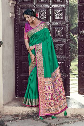 For A Decent And Formal Look, Grab This Pretty Elegant Looking Saree In Dark Color Paired With Contrasting Colored Blouse. This Saree And Blouse Are Fabricated On Silk Beautified With Broad Weaved Border.