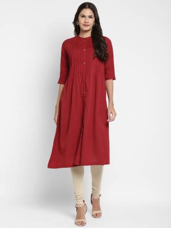 Grab This Readymade Long Kurti In Fine Color Fabricated On Cotton Beautified With Solid,Pintuch. It Is Light In Weight And Easy To Carry All Day Long. 