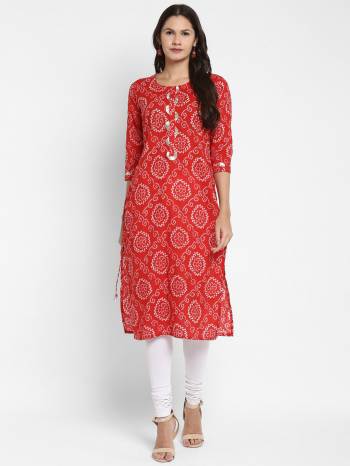 Grab This Readymade Long Kurti In Fine Color Fabricated On Cotton Beautified With Bandhani Printed,Gota Patti Work. It Is Light In Weight And Easy To Carry All Day Long. 