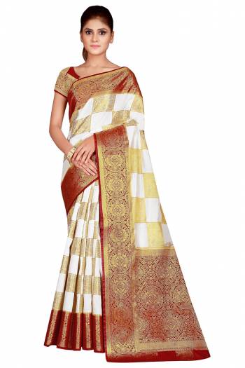 Adorn The Pretty Angelic Look Wearing This Heavy Weaving Jacquard Designer Saree In Fine Color Paired With Contrasting Colored Blouse. This Saree Is Fabricated On Nylon Silk Paired With Blouse. Its Pretty Color Pallete Will Give An Attractive Look To Your Personality. 
