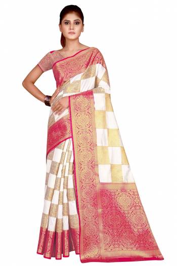 Adorn The Pretty Angelic Look Wearing This Heavy Weaving Jacquard Designer Saree In Fine Color Paired With Contrasting Colored Blouse. This Saree Is Fabricated On Nylon Silk Paired With Blouse. Its Pretty Color Pallete Will Give An Attractive Look To Your Personality. 
