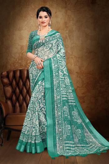 Adorn The Pretty Angelic Look Wearing This Heavy Designer Saree In Fine Color Paired With Blouse. This Saree Is Fabricated On Cotton Slub With Weaving Jari And Printed Paired With Blouse. Its Pretty Color Pallete Will Give An Attractive Look To Your Personality. 