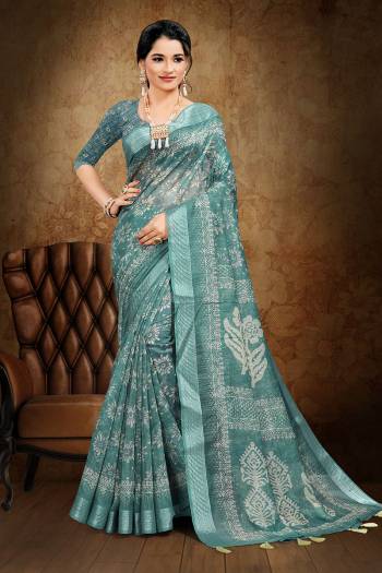 Adorn The Pretty Angelic Look Wearing This Heavy Designer Saree In Fine Color Paired With Blouse. This Saree Is Fabricated On Cotton Slub With Weaving Jari And Printed Paired With Blouse. Its Pretty Color Pallete Will Give An Attractive Look To Your Personality. 