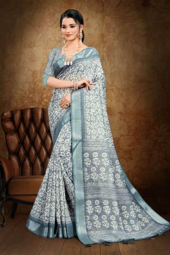 Adorn The Pretty Angelic Look Wearing This Heavy Designer Saree In Fine Color Paired With Blouse. This Saree Is Fabricated On Cotton Slub With Weaving Jari And Printed Paired With Blouse. Its Pretty Color Pallete Will Give An Attractive Look To Your Personality. 