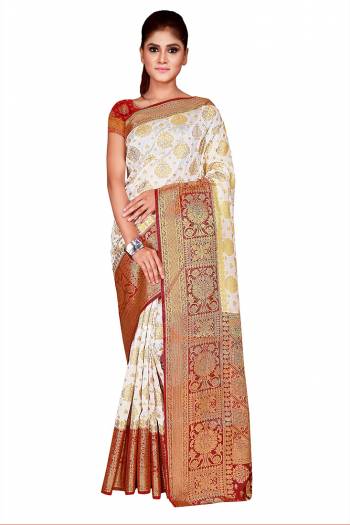 Celebrate This Festive Season In This Very Pretty Weaving Jacquard Designer Saree Paired With Contrasting Colored Blouse. This Saree and Blouse Are Nylon Silk Based Beautified Saree. 
