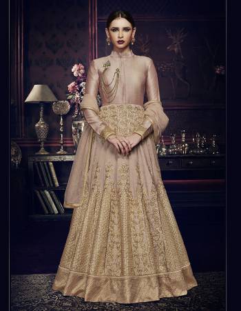 Rich And Elegant Looking Designer Dress Is Here In Light Color. Its Blouse,  Top,Bottom And Dupatta Are Fabricated On Silk Based Paired With Chiffon Fabricated Dupatta With Heavy Embroidery Work.