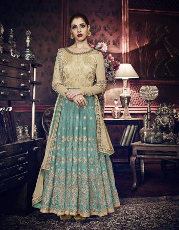 Rich And Elegant Looking Designer Dress Is Here In Light Color. Its Blouse,  Top,Bottom And Dupatta Are Fabricated On Silk Based Paired With Chiffon Fabricated Dupatta With Heavy Embroidery Work.