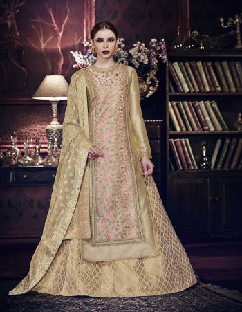 Rich And Elegant Looking Designer Dress Is Here In Light Color. Its Blouse,  Top,Bottom And Dupatta Are Fabricated On Silk Based Paired With Chiffon Fabricated Dupatta With Heavy Embroidery Work.