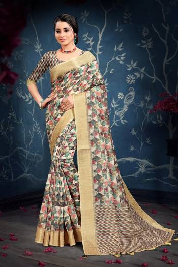 Celebrate This Festive Season In This Very Pretty Dusty Colored Designer Saree Paired With Contrasting Colored Blouse. This Saree and Blouse Are Cotton Based Beautified With Detailed Weving Jacquard Border. 