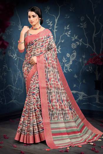 Celebrate This Festive Season In This Very Pretty Dusty Colored Designer Saree Paired With Contrasting Colored Blouse. This Saree and Blouse Are Cotton Based Beautified With Detailed Weving Jacquard Border. 