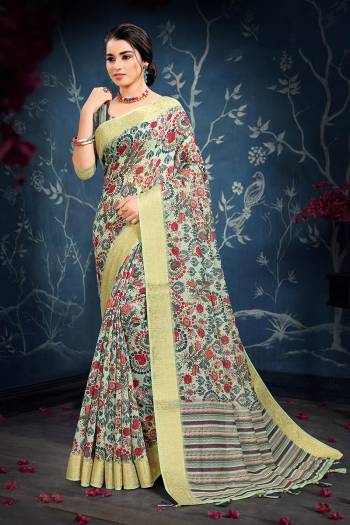 Celebrate This Festive Season In This Very Pretty Dusty Colored Designer Saree Paired With Contrasting Colored Blouse. This Saree and Blouse Are Cotton Based Beautified With Detailed Weving Jacquard Border. 