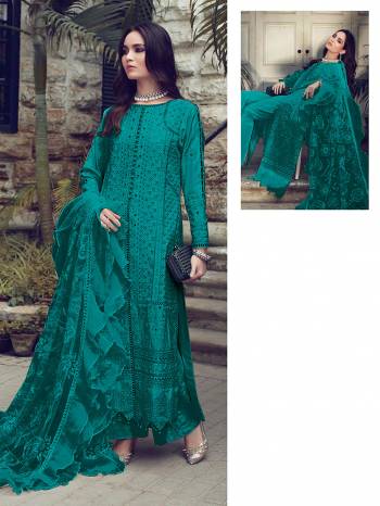 You Will Definitely Earn Lots Of Compliments Wearing This Designer Floor Length Suit In Aqua Blue Color. Its Pretty Top Is Cotton Based Paired With Cotton Bottom And Net Fabricated Dupatta. Its Pretty Color And Pattern Will Give You A Look Like Never Before.