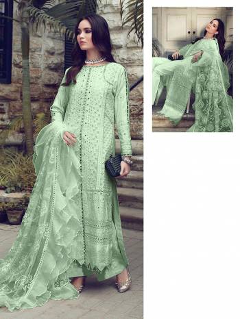 You Will Definitely Earn Lots Of Compliments Wearing This Designer Floor Length Suit In Pista Color. Its Pretty Top Is Cotton Based Paired With Cotton Bottom And Net Fabricated Dupatta. Its Pretty Color And Pattern Will Give You A Look Like Never Before.