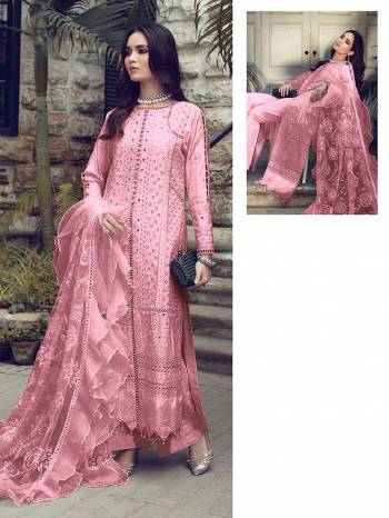 You Will Definitely Earn Lots Of Compliments Wearing This Designer Floor Length Suit In Pink Color. Its Pretty Top Is Cotton Based Paired With Cotton Bottom And Net Fabricated Dupatta. Its Pretty Color And Pattern Will Give You A Look Like Never Before.