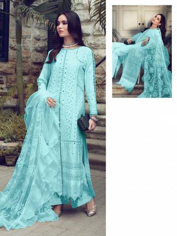 You Will Definitely Earn Lots Of Compliments Wearing This Designer Floor Length Suit In Sky Blue Color. Its Pretty Top Is Cotton Based Paired With Cotton Bottom And Net Fabricated Dupatta. Its Pretty Color And Pattern Will Give You A Look Like Never Before.