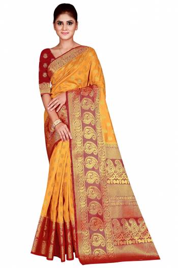 Look Attractive Wearing This Colored Saree Paired With Contrasted Colored Blouse.  This Heavy Weving Designer Saree Is Nylon Silk Based Which Gives A Rich Look To Your Personality. Buy This Pretty Saree Now.
