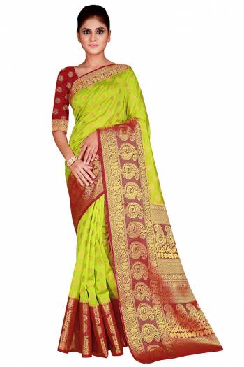 Look Attractive Wearing This Colored Saree Paired With Contrasted Colored Blouse.  This Heavy Weving Designer Saree Is Nylon Silk Based Which Gives A Rich Look To Your Personality. Buy This Pretty Saree Now.
