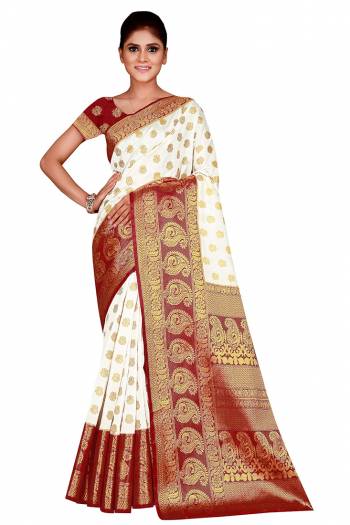 Look Attractive Wearing This Colored Saree Paired With Contrasted Colored Blouse.  This Heavy Weving Designer Saree Is Nylon Silk Based Which Gives A Rich Look To Your Personality. Buy This Pretty Saree Now.
