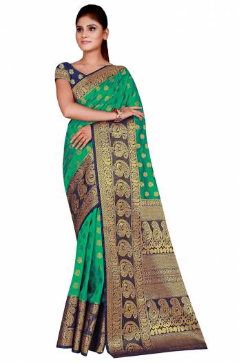 Look Attractive Wearing This Colored Saree Paired With Contrasted Colored Blouse.  This Heavy Weving Designer Saree Is Nylon Silk Based Which Gives A Rich Look To Your Personality. Buy This Pretty Saree Now.
