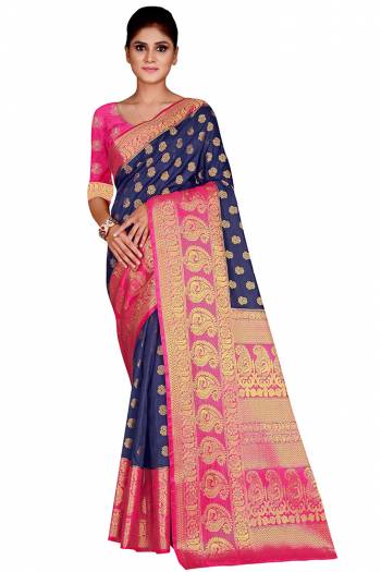 Look Attractive Wearing This Colored Saree Paired With Contrasted Colored Blouse.  This Heavy Weving Designer Saree Is Nylon Silk Based Which Gives A Rich Look To Your Personality. Buy This Pretty Saree Now.
