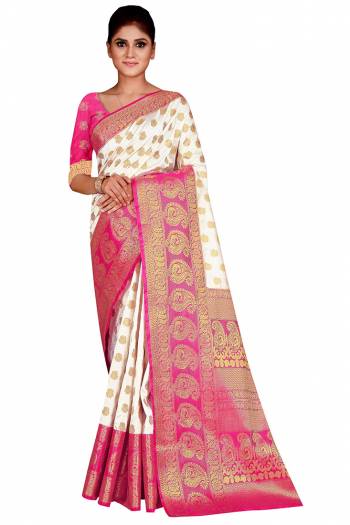 Look Attractive Wearing This Colored Saree Paired With Contrasted Colored Blouse.  This Heavy Weving Designer Saree Is Nylon Silk Based Which Gives A Rich Look To Your Personality. Buy This Pretty Saree Now.
