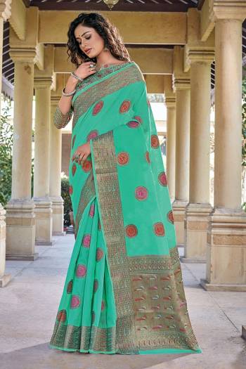 Adorn The Pretty Angelic Look Wearing This Heavy Designer Wevon Saree In Sea Green Color Paired With Blouse. This Saree Is Fabricated On Cotton Handloom Paired With Blouse. Its Pretty Color Pallete Will Give An Attractive Look To Your Personality. 